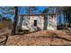 Tan house with red shutters and a yard at 2531 Ridgecrest Nw Dr, Kennesaw, GA 30152