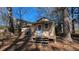 Tan colored shed with wooden steps and chicken coop at 2531 Ridgecrest Nw Dr, Kennesaw, GA 30152