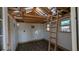 Unfinished interior with loft, ladder, and wood flooring at 2531 Ridgecrest Nw Dr, Kennesaw, GA 30152