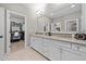 Bathroom with double vanity, granite countertop and walk-in closet at 3465 Fenton Se Dr, Smyrna, GA 30080