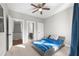 Bright bedroom with double bed and access to a full bathroom at 3465 Fenton Se Dr, Smyrna, GA 30080