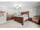 Spacious bedroom with large bed, dresser, and ceiling fan at 3465 Fenton Se Dr, Smyrna, GA 30080