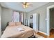 Bedroom with a full bed, hardwood floors, and ceiling fan at 461 Trabert Nw Ave, Atlanta, GA 30309