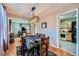 Bright dining room with hardwood floors and chandelier at 461 Trabert Nw Ave, Atlanta, GA 30309