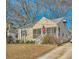 Cute ranch home with a screened porch and American flag at 461 Trabert Nw Ave, Atlanta, GA 30309