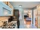 Kitchen with stainless steel appliances and view into living room at 461 Trabert Nw Ave, Atlanta, GA 30309