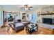 Spacious living room with L-shaped sofa and hardwood floors at 461 Trabert Nw Ave, Atlanta, GA 30309