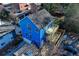 Blue house with deck and parking, aerial view at 991 Greenwood Ne Ave, Atlanta, GA 30306