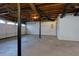 Unfinished basement with high ceilings and garage access at 991 Greenwood Ne Ave, Atlanta, GA 30306