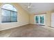 Bright bedroom with large arched window and access to deck at 991 Greenwood Ne Ave, Atlanta, GA 30306