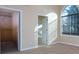 Bright bedroom with carpet, large window, and walk-in closet at 991 Greenwood Ne Ave, Atlanta, GA 30306