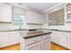 Spacious kitchen with white cabinets and granite countertops at 991 Greenwood Ne Ave, Atlanta, GA 30306