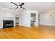 Bright living room with hardwood floors, fireplace, and open floor plan at 991 Greenwood Ne Ave, Atlanta, GA 30306