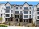 Luxury townhomes with stone accents and modern design at 2034 Juliette Ave, Alpharetta, GA 30009