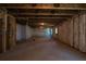Unfinished basement with exposed beams at 307 Willam Gossett Dr, Canton, GA 30114