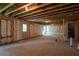 Spacious unfinished basement with a walkout, offering a blank canvas for creating a dream entertainment space at 307 Willam Gossett Dr, Canton, GA 30114
