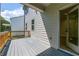 Private deck with gray composite decking and wooden railings at 311 Willam Gossett Dr, Canton, GA 30114