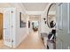 Light and bright entryway with a bench and large mirror at 1446 Auburn Glen Rd, Dacula, GA 30019