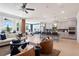 Open floor plan boasts a spacious kitchen island and Gathering room with comfortable seating at 1446 Auburn Glen Rd, Dacula, GA 30019