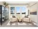 Relaxing sitting area with two armchairs and a coffee table at 1446 Auburn Glen Rd, Dacula, GA 30019