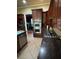 Modern kitchen features stainless steel appliances, double ovens, gas range and granite countertops at 1520 Vassar Ave, College Park, GA 30337