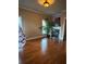 Cozy living room with fireplace and large windows to bring in natural light at 1520 Vassar Ave, College Park, GA 30337