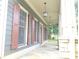 Front porch with stone pillars and a flagstone floor at 1520 Vassar Ave, College Park, GA 30337