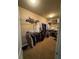 Walk-in closet with wire shelving and carpeted floor at 1520 Vassar Ave, College Park, GA 30337