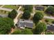 House nestled amongst lush trees in a quiet neighborhood at 114 Tracy Ln, Mcdonough, GA 30253