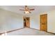 Simple bedroom with wood floors and ceiling fan at 114 Tracy Ln, Mcdonough, GA 30253