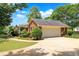 Attached brick garage with ample driveway space at 114 Tracy Ln, Mcdonough, GA 30253