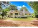 Ranch house back view, deck, and large backyard at 114 Tracy Ln, Mcdonough, GA 30253