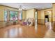 Bright living room with hardwood floors and bay window at 114 Tracy Ln, Mcdonough, GA 30253