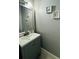 Small half bathroom with vanity and gray walls at 2919 Riverwalk Cv, Decatur, GA 30034