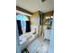 Bathroom with soaking tub and linen closet at 2919 Riverwalk Cv, Decatur, GA 30034