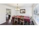 Bright dining room with hardwood floors and a large table at 3007 Winding Sw Way, Lilburn, GA 30047