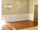 Bright dining room with hardwood floors and a chandelier at 307 Creek Manor Way, Suwanee, GA 30024