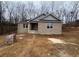 New construction home with brick exterior and a large front yard at 3383 Milan Ct, Douglasville, GA 30135