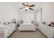 Bedroom with a canopy bed, dressers, and soft color scheme at 3998 St Georges Ct, Duluth, GA 30096