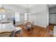 Kitchen breakfast nook with round table and chairs, hardwood floors at 3998 St Georges Ct, Duluth, GA 30096