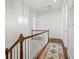 Upstairs hallway with a chandelier and hardwood floors at 3998 St Georges Ct, Duluth, GA 30096