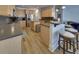 Modern kitchen with stainless steel appliances and an island at 6320 Glen Oaks Ln, Sandy Springs, GA 30328