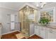 Bathroom with a large glass shower and granite vanity at 820 Oak Ter, Norcross, GA 30071