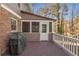 Deck with built-in grill and access to screened porch at 820 Oak Ter, Norcross, GA 30071