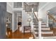 Bright entryway with hardwood floors and elegant staircase at 820 Oak Ter, Norcross, GA 30071