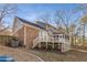 House exterior with brick and siding and deck at 820 Oak Ter, Norcross, GA 30071