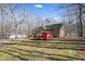 Large backyard with chicken coop and RV parking at 15 Indian Woods Ne Dr, Rydal, GA 30171