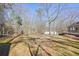 Large backyard with wooded area and RV at 15 Indian Woods Ne Dr, Rydal, GA 30171