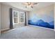 Bright bedroom with mountain mural and ceiling fan at 15 Indian Woods Ne Dr, Rydal, GA 30171