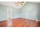 Hardwood floors, vaulted ceiling, and ceiling fan in this tranquil bedroom at 15 Indian Woods Ne Dr, Rydal, GA 30171